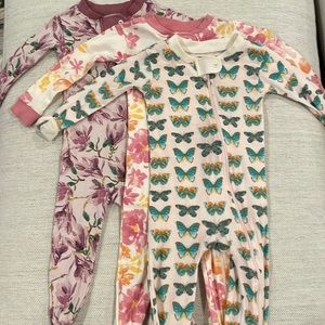 Worn once, almost new 3 footie onesies from Burt’s Bee. 12 month size for all 3